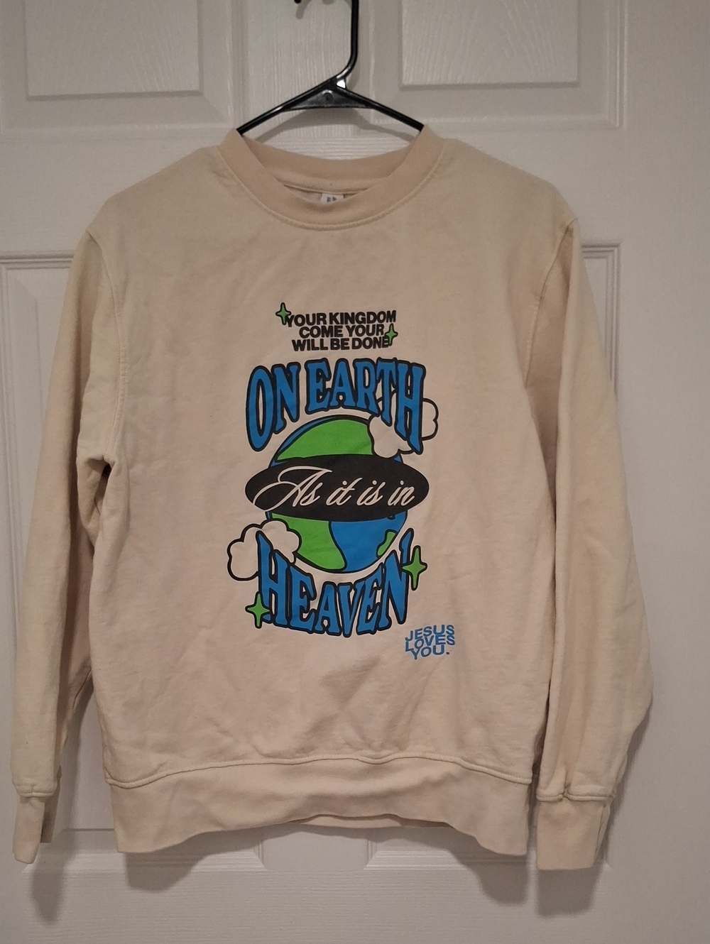 JUSTHOODIS  Cream Graphic Crewneck Sweatshirt - On Earth As It Is In Heaven. MED